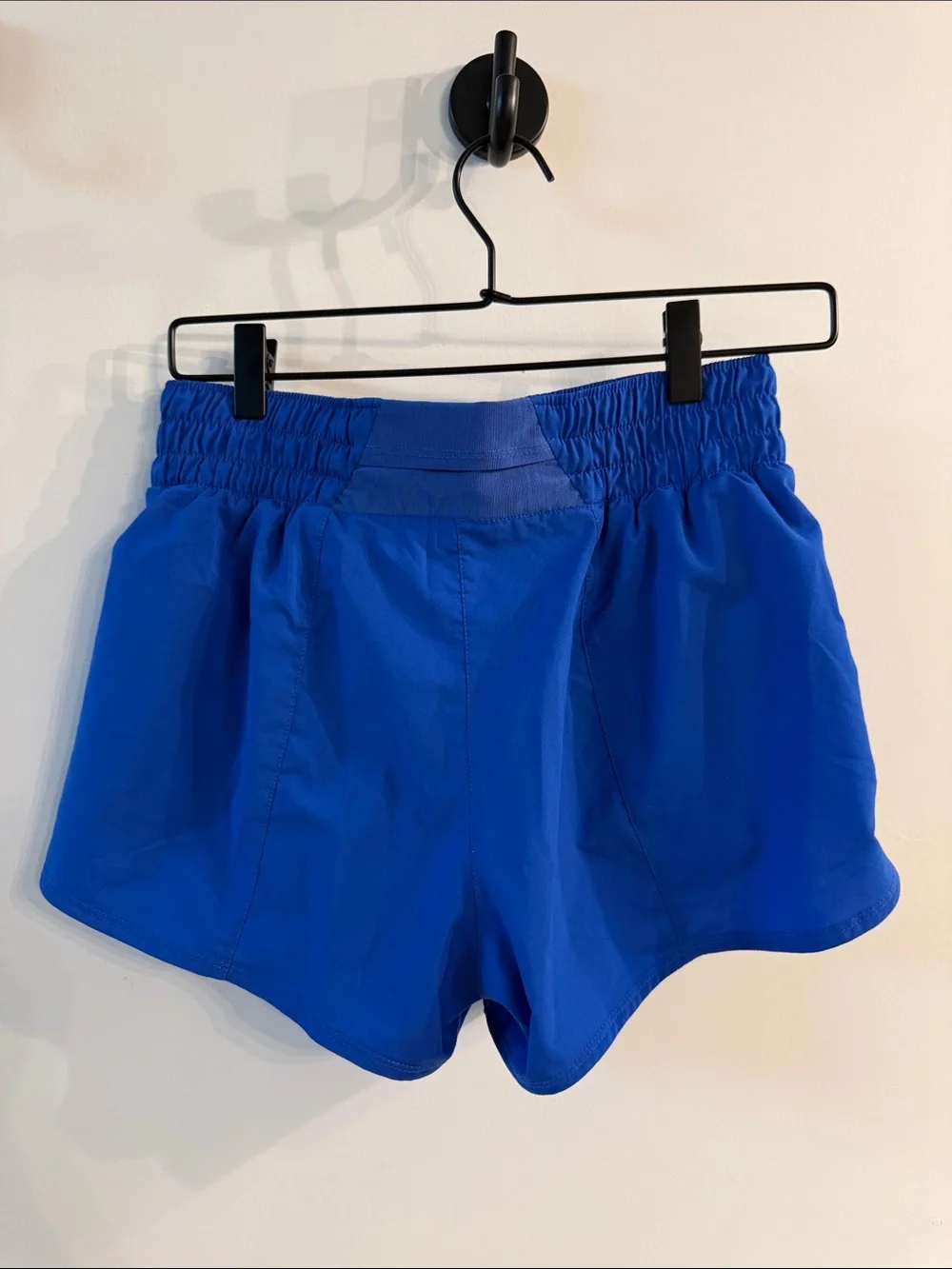 Nike Women’s Blue Athletic Running Shorts with White Swoosh